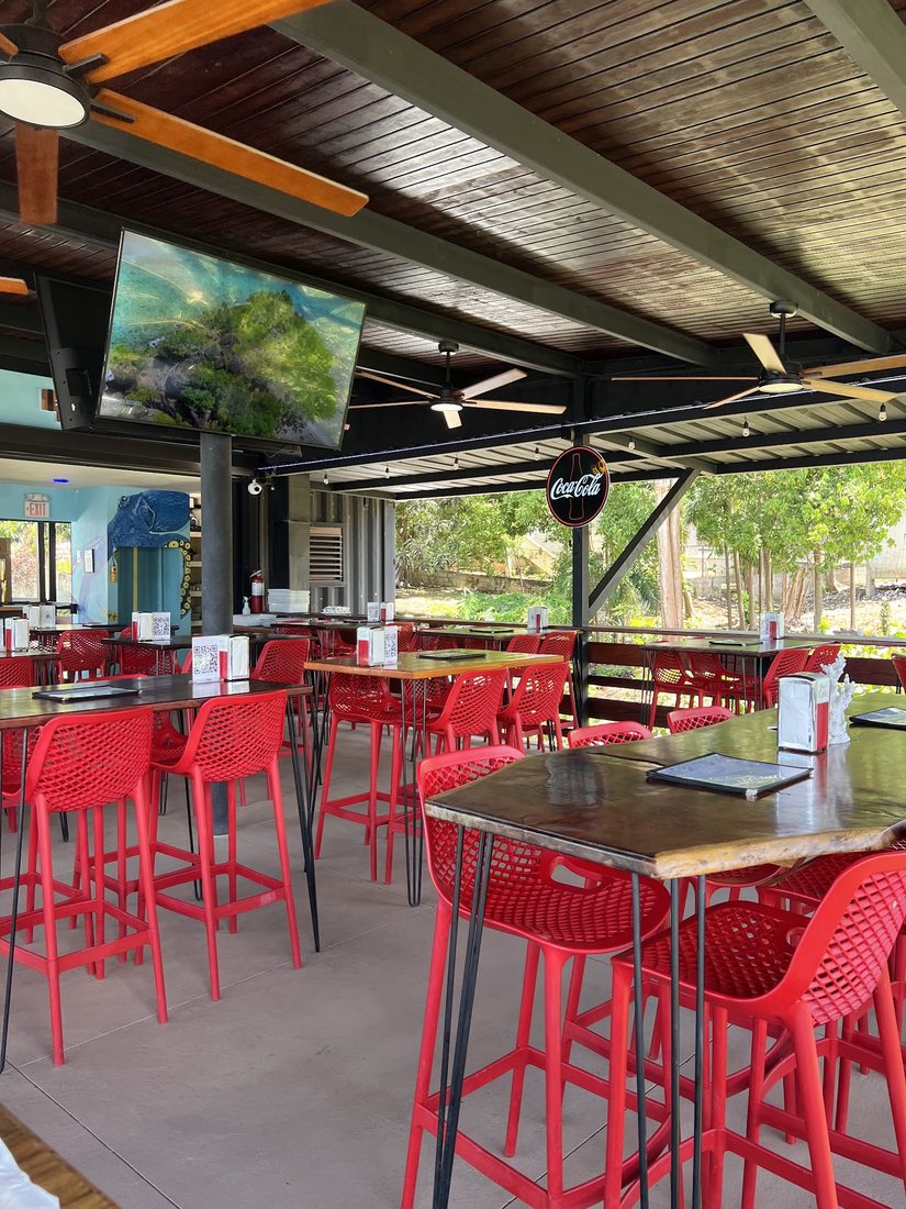 El Norte's open-air dining room with red stools, Vieques
