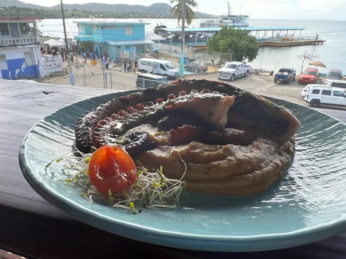 A plate with the ferry pier view behind