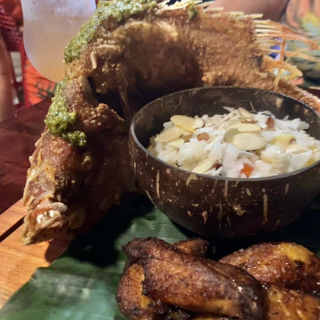 Whole fried capitan fish with coconut rice